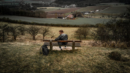 Man standing on agricultural field