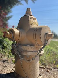 Close-up of fire hydrant against sky