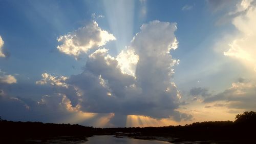 Sun shining through clouds