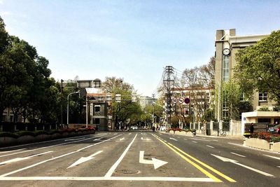 Road in city against sky