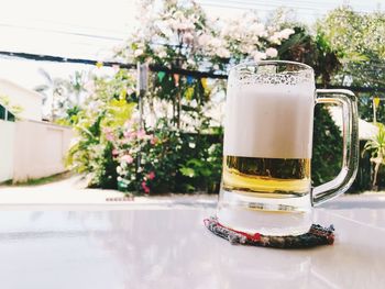 Close-up of beer glass on table