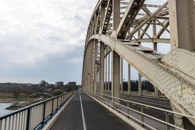 View of bridge against cloudy sky