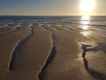 Scenic view of beach during sunset