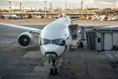 High angle view of airplane on airport runway