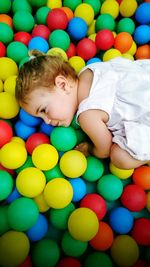 Boy playing with ball at home