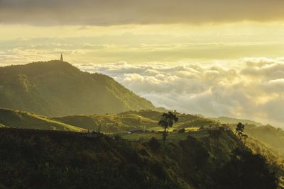 Scenic view of landscape against sky during sunset