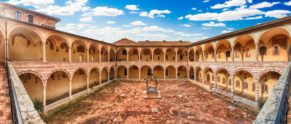 View of historic building against cloudy sky