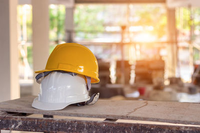 Hardhats on table in old building