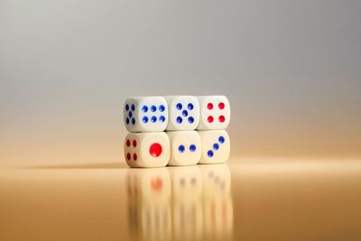 Close-up of dice stacked on table