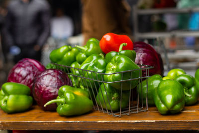 Close-up of tomatoes in basket on table