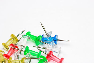 Close-up of flags over white background