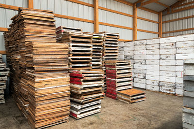 Stacks of beekeeping equipment at workshop