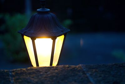 Close-up of illuminated lantern at night