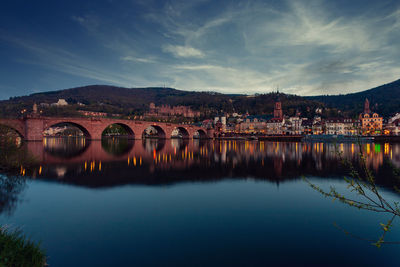 Panoramic view of heidelberg's old town with the castle at dusk, germany.