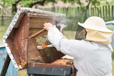 Low section of man working on water