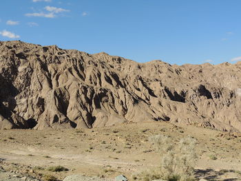 Scenic view of rocky mountains against sky