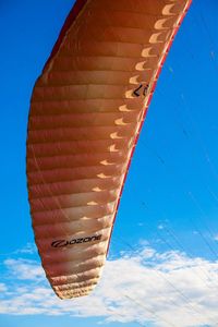 Low angle view of hot air balloon against clear blue sky