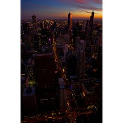 Illuminated cityscape at night