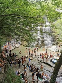 Group of people enjoying in water