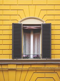 Window of yellow building