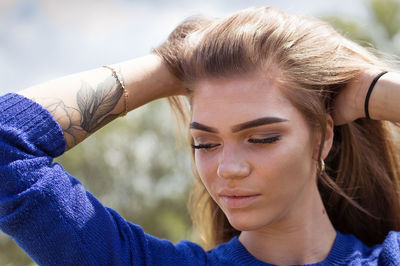 Close-up portrait of young woman