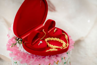 Close-up of wedding rings on table