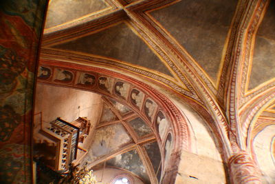 Low angle view of ornate ceiling of building