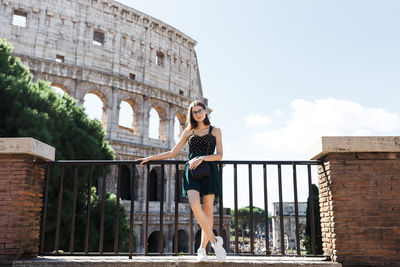 Young tourist walks the streets of rome in summer