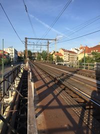 Railroad tracks against sky