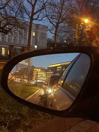 Reflection of illuminated street light at night