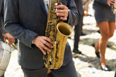 Group of musicians are seen playing musical instruments during the independence celebration 