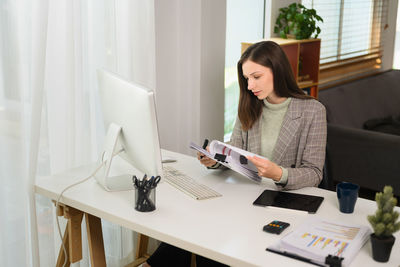 Businesswoman working at office