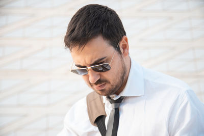 Portrait of young man wearing sunglasses