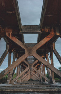 Low angle view of old bridge against sky