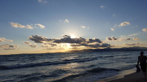 Scenic view of sea at sunset