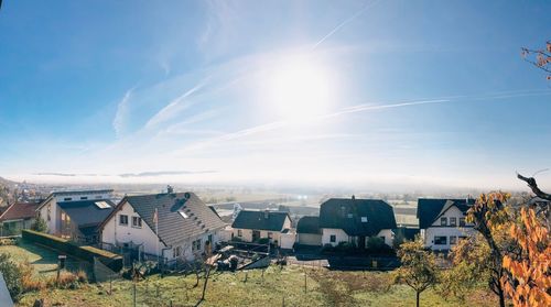 High angle view of houses against sky