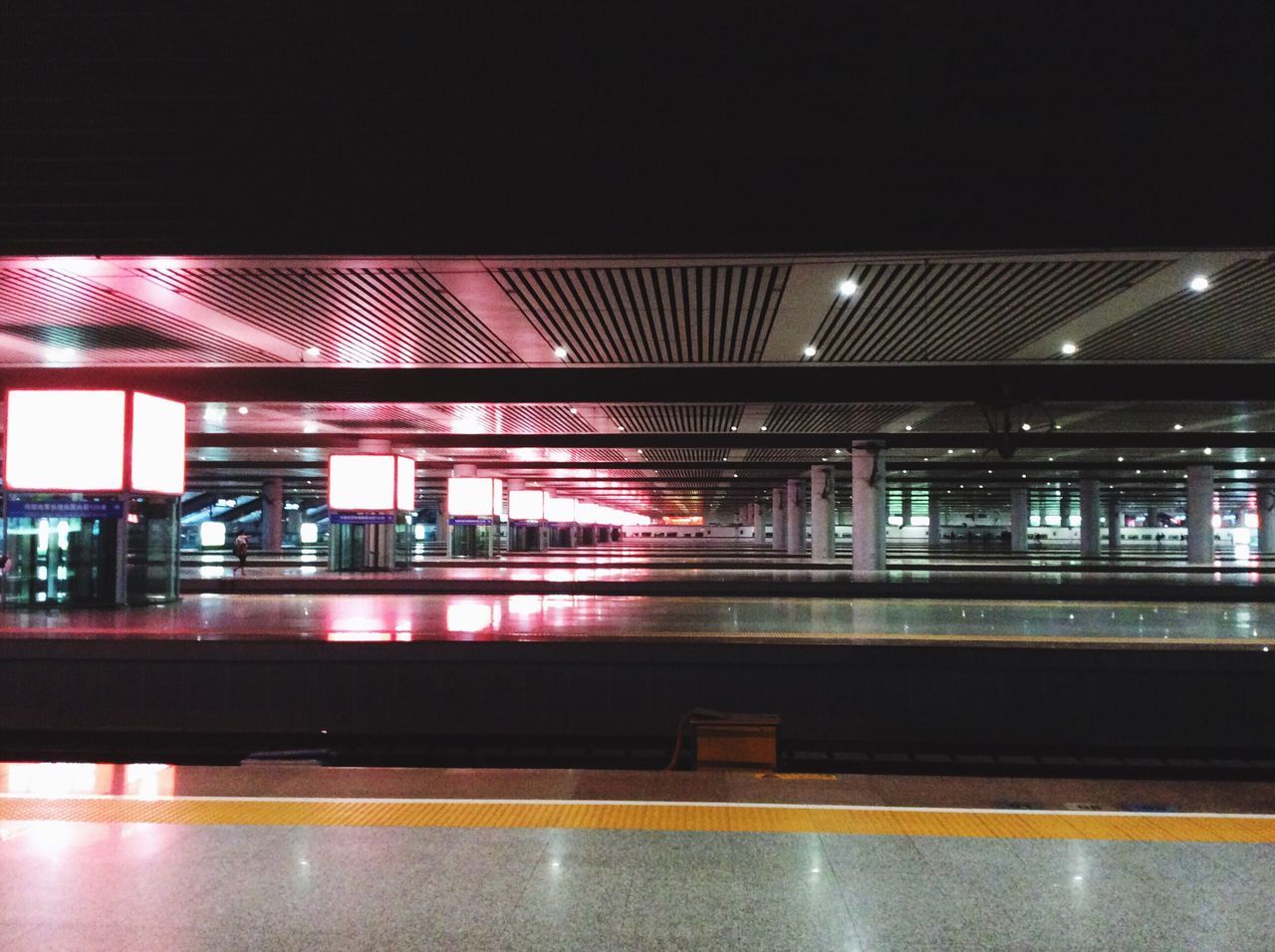 illuminated, architecture, built structure, railroad station, public transportation, subway station, modern, subway, train, transportation building - type of building, empty, city, architectural column, city life, no people