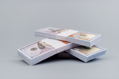 Close-up of paper currency on white background