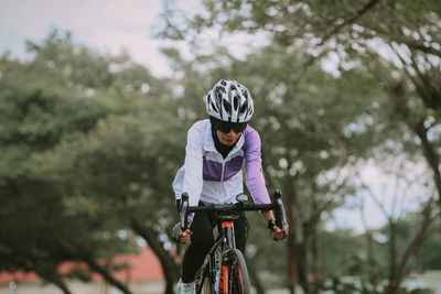 Woman riding bicycle