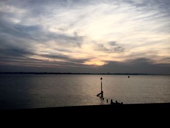 Scenic view of sunset over sea