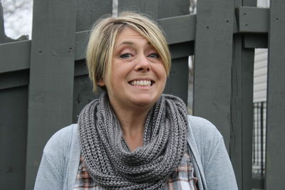 Portrait of a smiling woman in fall fashion wear.  outdoors