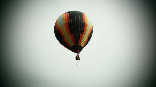 Low angle view of hot air balloon against clear sky