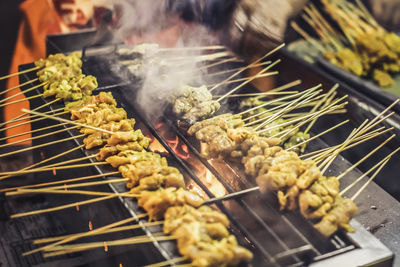 Close-up of meat on barbecue grill
