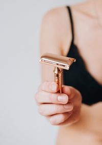 Woman body part with safety shaving razor