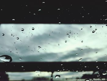 Close-up of water drops on glass