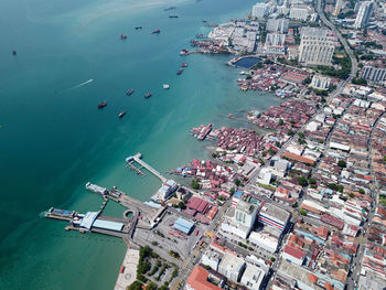 High angle view of marina and buildings in city