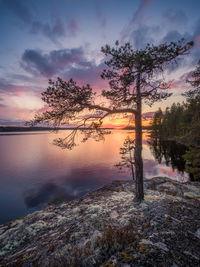 Scenic view of lake against sky during sunset