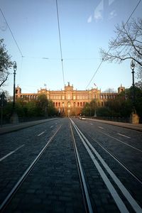 Railroad tracks against clear sky