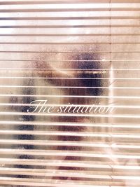 Close-up of text on carpet