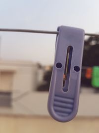 Close-up of vintage car against sky